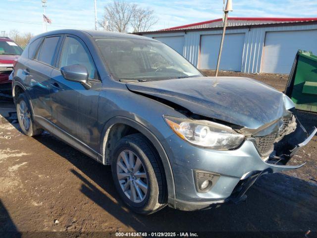  Salvage Mazda Cx