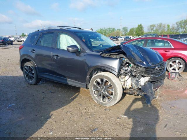  Salvage Mazda Cx