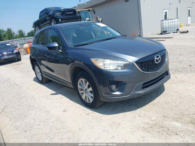  Salvage Mazda Cx